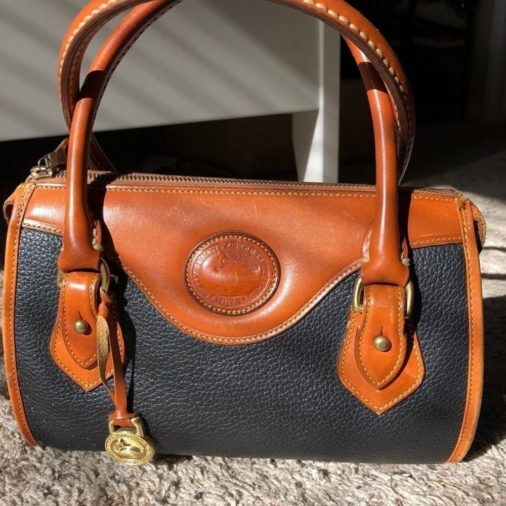 Dooney & Bourke Black and Brown Satchel with Structured Design